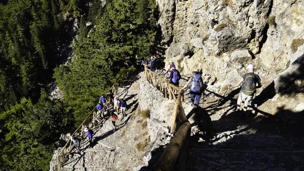 Steep wooden stairs at Xyloskalo, the northern entrance of Samaria Gorge in the White Mountains of Crete.